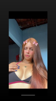 Ruivinha tatuada